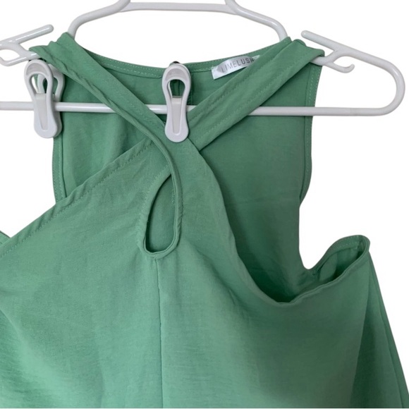 LIMELUSH Tops - Lime Lush NWOT Green Tank Size S Criss-Cross in front w/circle cut-out.
